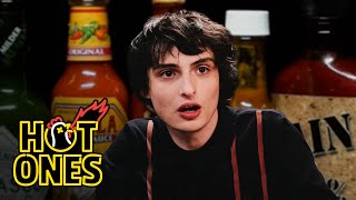 Finn Wolfhard Embraces Insanity While Eating Spicy Wings  Hot Ones [upl. by Ryann133]