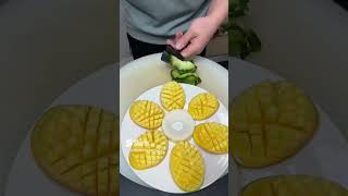 The chef cuts the mango into a nice and appetizing shape with just a few cuts [upl. by Nethsa]