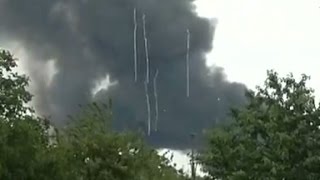 Malaysia Airlines debris seen falling from the sky in Ukraine [upl. by Nomyaw435]