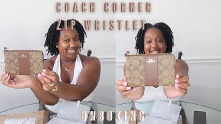 UNBOXING COACH CORNER ZIP WRISTLET IN SIGNATURE CANVAS GOLD KHAKI SADDLE 2 [upl. by Eiznik]