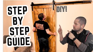 How to install a sliding barn door [upl. by Trixie]