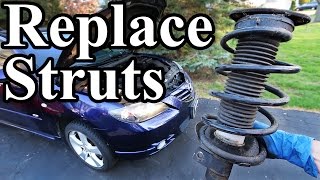 How to Replace Struts in your Car or Truck [upl. by Souza]