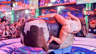 Pretty Girl in Beautiful Dress Riding on a Bull in Benidorm  Mechanical Bull 4K Epic Fail August [upl. by Eiramanig974]