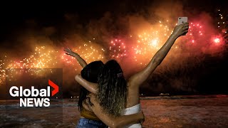 New Years 2023 Copacabana beach sizzles in Rio de Janeiro as fireworks illuminate night sky [upl. by Sisson]