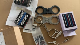 Package unboxing from handcuff warehouse Three new handcuffs one new swivel key [upl. by Madelena]