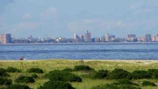 Greater NY skyline panorama  from Long Island to Downtown Manhattan as seen from Sandy Hook NJ [upl. by Barrow798]