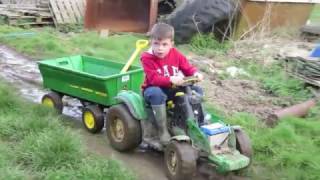 Kids playing on tractors digging amp shovelling mud children on the farm TRACTOR SONG [upl. by Minsk]