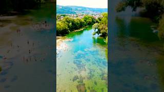 quotDrone Soars Over Crystal Clear Emerald River with Swimmers Below  Natures Paradisequot 🍀🏞 [upl. by Brote]