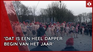 Veendammers starten nieuwe jaar met natte nieuwjaarsduik [upl. by Cantone219]