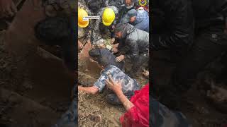 Police rescue 2yearold boy buried in landslide news rescue nepal landslide [upl. by Innad]