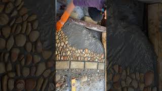 How to do Mosaic Floors with Stones Pebbles mosaic stoneart shorts [upl. by Hoj]