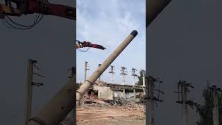 Demolition process of tall concrete pillar [upl. by Lezley]