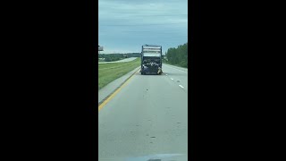 Viewer video shows trash spilling from truck onto roadway city says truck suffered malfunction [upl. by Ballman]