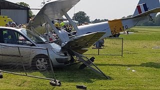 Woman is airlifted to hospital after former RAF plane crashes into her car at charity air show [upl. by Stalker]