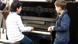 Piano prodigy kid performing on quotSession streetquot in Lviv [upl. by Howlond]