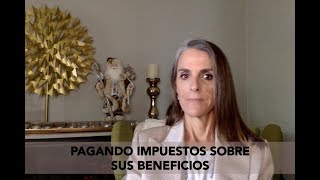 Pagando impuestos sobre sus beneficios [upl. by Elleinahc]