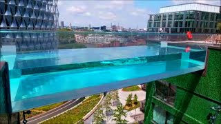 SKY POOL LONDON EMBASSY GARDENS THE WORLDS FIRST FLOATING POOL TRANSPARENT POOL 115 FEET HIGH [upl. by Torbart497]