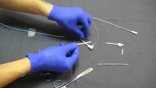 How to shorten a coronary guide catheter [upl. by Alleyn714]