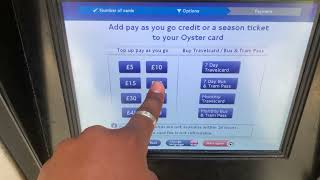 How to buy a Oyster card the public transport smartcard in London in the United Kingdom [upl. by Tnomad102]