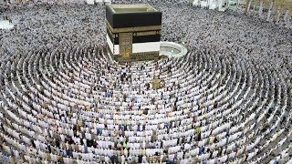 Thousands of Muslim worshippers perform prayers around the Kaaba [upl. by Douglass215]