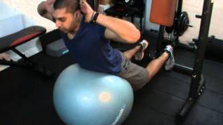 How to perform Stability Ball Hyperextensions [upl. by Tinor]