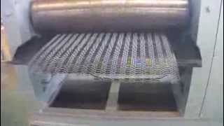 Expanded metal mesh flattening machine [upl. by Dzoba385]