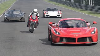 Ducati Superleggera V4 vs Ferrari LaFerrari vs Porsche 918 Spyder vs McLaren P1 at Nordschleife [upl. by Siuraj]