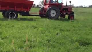 Spreading lime with Allis Chalmers 200 with lime trailer [upl. by Byran880]