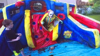 Scary Clown Attacks Through Inflatable Water Slide [upl. by Wilhide]