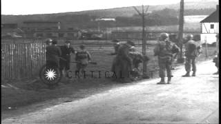 German soldiers are checked after they surrender and US soldiers advance in WurdiHD Stock Footage [upl. by Jeremie]