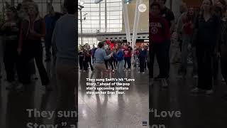 Taylor Swift flash mob breaks out at airport ahead of Eras show  USA TODAY Entertainment [upl. by Monahan]