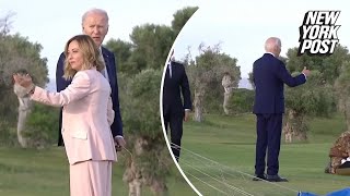 Biden appears to wander off at G7 summit before being pulled back by Italian PM [upl. by Paehpos342]