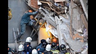 Death toll in Russian building collapse rises to 14 [upl. by Adnolat823]