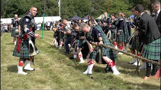 Tug o War competition with Ballater Pipe Band v audience during 2023 Tomintoul Highland Games [upl. by Gayn301]