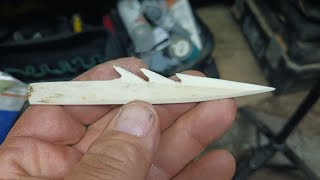 Bow fishing fishing spear atlatl fishing point crafted from whitetail deer bone [upl. by Adnamra]