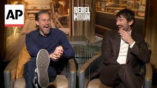 Rebel Moon interview Charlie Hunnam amp Michiel Huisman on Zack Snyders CUT calls AI [upl. by Jeunesse]