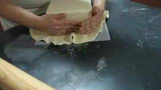 Covering a square cake with fondant [upl. by Eillak]