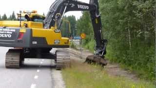 Volvo EC250DL ditching with Oilquick Rototilt [upl. by Ellyn]