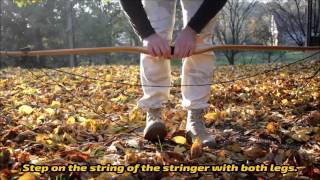 How to use a stringer to string up a longbow style bow [upl. by Eckart982]