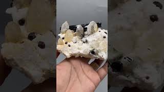 Spessartine combines with quartz and black tourmaline and quartz on feldspar [upl. by Edd]