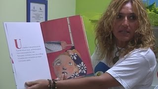 Napoli  Policlinico una biblioteca per bambini non udenti 290615 [upl. by Gwynne]