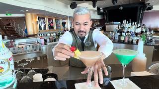 Drink of the Week Double Trouble Curaçao Cosmo and French Martini From Amazing Carlos at Sky Bar [upl. by Htir536]