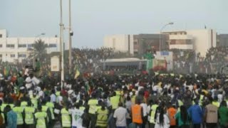 CAN2022 les joueurs du Sénégal de retour à Dakar accueillis par une marée humaine  AFP Images [upl. by Golda]