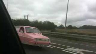 PlasticPig Reliant Robin towing another on motorway [upl. by Karim]