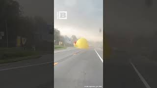 What the DUCK Giant Inflatable Duck Bounces Across Road [upl. by Mischa]