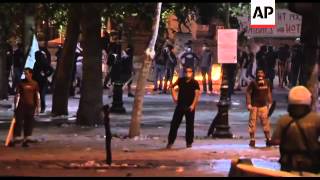 Protesters set fires in central Athens night shots [upl. by Happ]