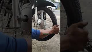 how to insert tires by hand shorts motorcycle howto [upl. by Latsyrhc731]