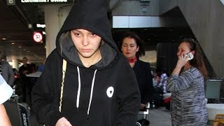 LilyRose Depp Pulls Her Hood Up At LAX [upl. by Aihcropal]