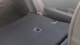 How to fold down seats Kia Rio [upl. by Krystyna]