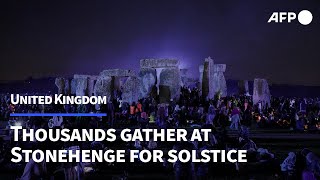 Thousands gather at Stonehenge to celebrate summer solstice  AFP [upl. by Erdah212]